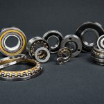 Angular Contact bearings photographed on gray background