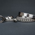 Tapered Roller bearings photographed on gray background