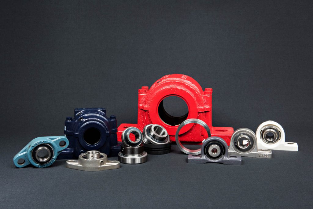 Housings for bearings photographed on gray background